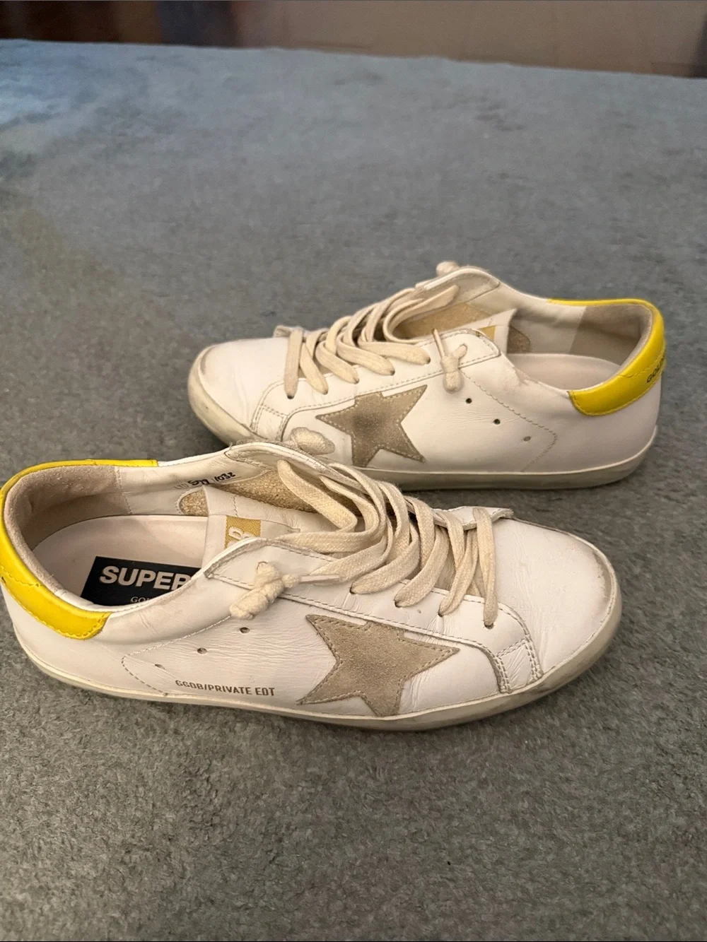 Golden Goose Super-Star Low Top White Sneakers with Yellow Heel Accent - Picture 4 of 5